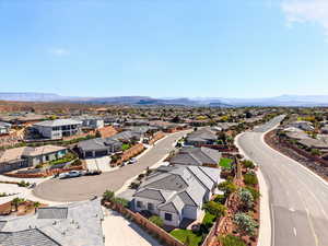 Aerial perspective of suburban area with a mountain backdrop