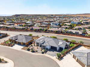 Aerial view of residential area featuring a mountain backdrop