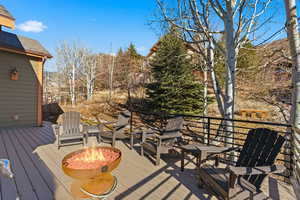 Deck featuring a fire pit