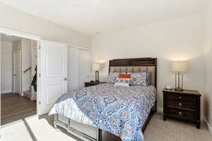 Bedroom featuring baseboards and a closet