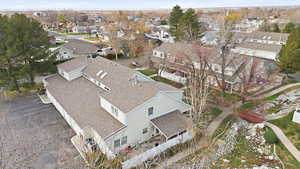 View of property location with nearby suburban area