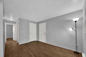 Living Room with brand new LVP flooring and a baseboard radiator