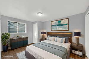 Virtually Staged Bedroom with brand new LVP wood floors and fresh coat of paint