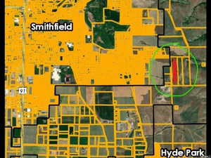 Aerial overview of property's location featuring property parcel outlined