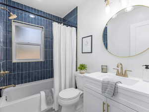 Upstairs Hall bathroom with vanity and shower / bath combination