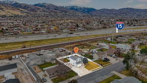 Aerial view of residential area with a mountainous background