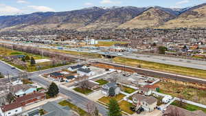 Aerial view of residential area with a mountain backdrop