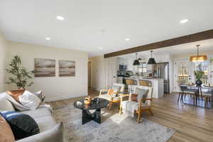 Living area featuring recessed lighting and light wood-type flooring