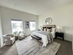 Carpeted bedroom with baseboards