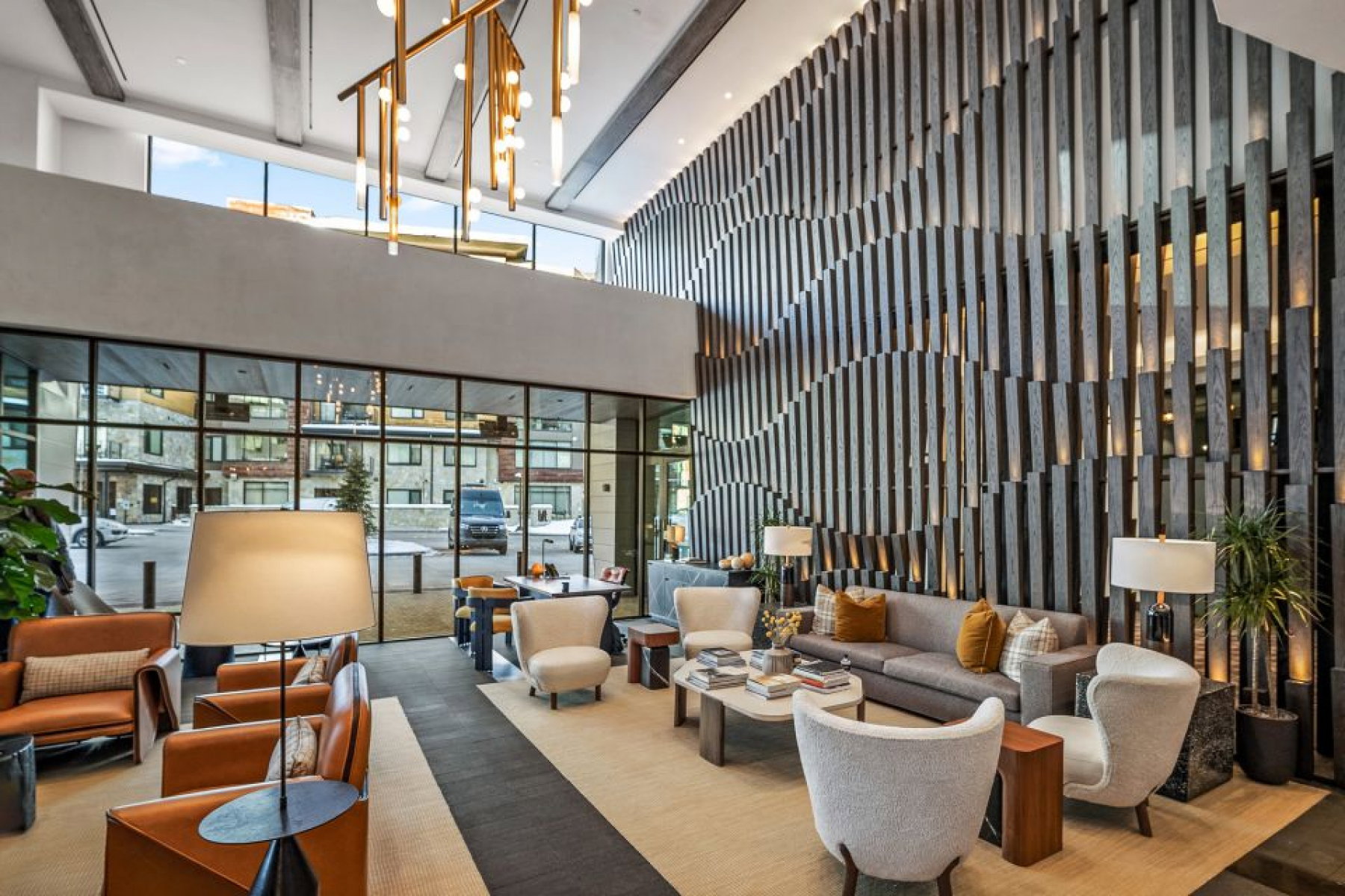 Common area featuring a high ceiling and floor to ceiling windows
