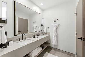 Bathroom featuring double vanity