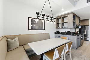 Dining area featuring light wood-type flooring