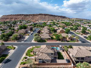 Aerial view of residential area with a mountain backdrop