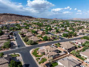 Aerial view of residential area featuring mountains