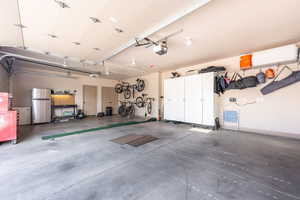 Garage with freestanding refrigerator