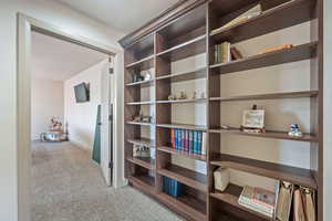 Corridor with carpet floors