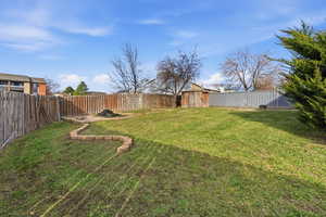 View of fenced backyard