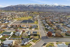 View of property location with nearby suburban area and mountains