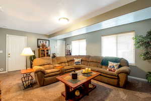 Living room featuring carpet floors