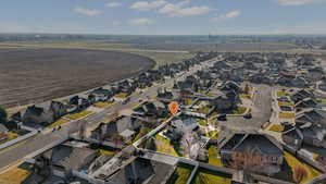 Aerial view of property's location featuring nearby suburban area