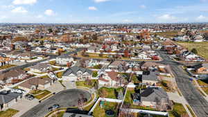 Aerial overview of property's location with nearby suburban area
