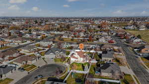 Aerial view of property's location featuring nearby suburban area