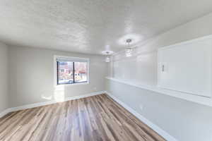 Bedroom with new wood finished floors