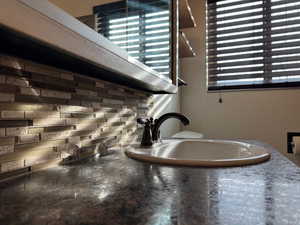 Detailed view of decorative backsplash and a sink