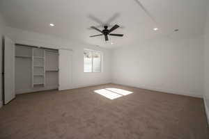 Unfurnished bedroom with ceiling fan, light carpet, recessed lighting, and a closet