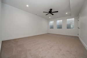 Spare room with light colored carpet, recessed lighting, and ceiling fan