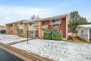 View of front of house with brick siding