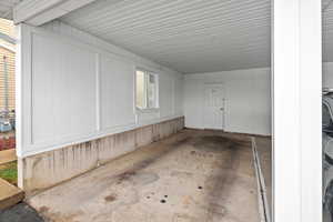 View of carport and ourdoor storage closet