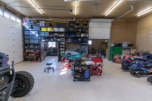 Garage featuring a workshop area