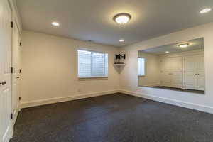 Empty room with recessed lighting
