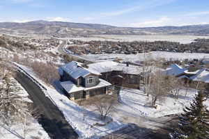 Snowy aerial view with a mountain view