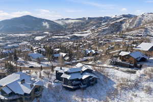 Snowy aerial view with a mountain view