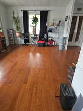 Sitting room featuring hardwood / wood-style floors