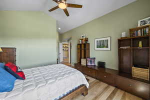 Primary bedroom with ensuite bath and large walk-in closet.
