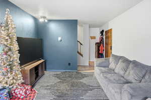 Living area featuring baseboards