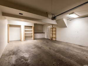 Garage featuring a garage door opener