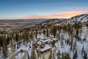 Snowy aerial view with a mountain view