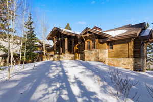 View of front of home featuring stone siding
