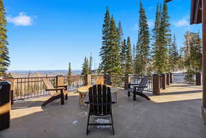 View of patio / terrace featuring an outdoor fire pit
