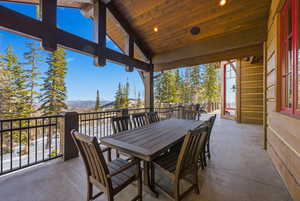 View of patio / terrace with a mountain view and outdoor dining space