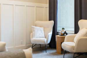 Living area featuring carpet flooring