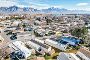 Aerial view of residential area featuring mountains