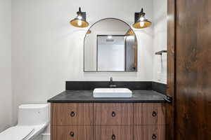 Bathroom with vanity and toilet