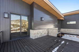 Wooden deck featuring a mountain view
