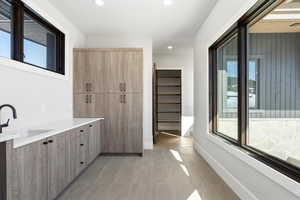 Bathroom featuring vanity and recessed lighting