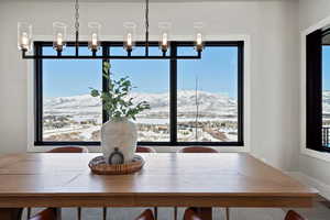 Dining space featuring a mountain view and a chandelier
